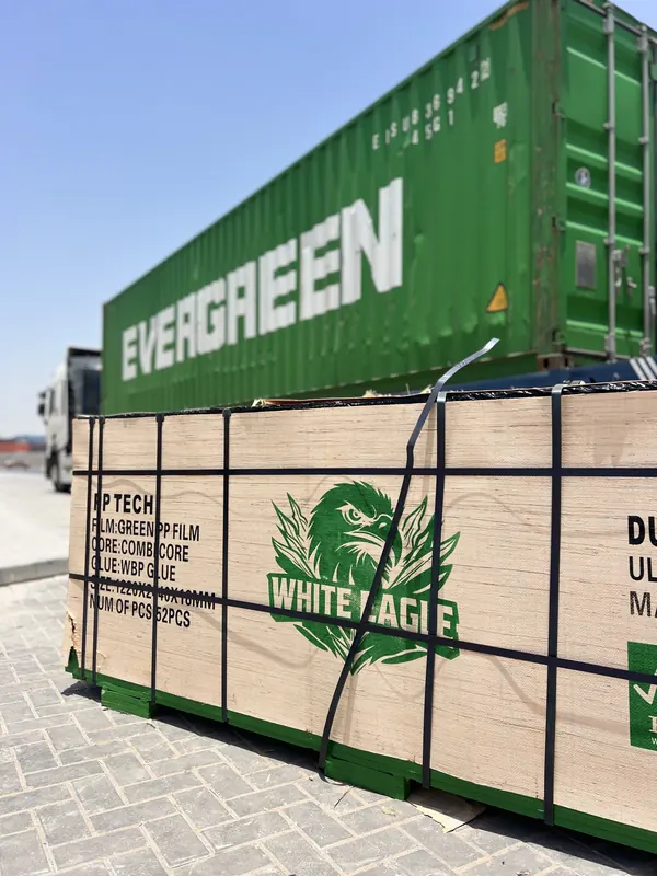 Strapped bundle of White Eagle PP Tech plywood with its specification label